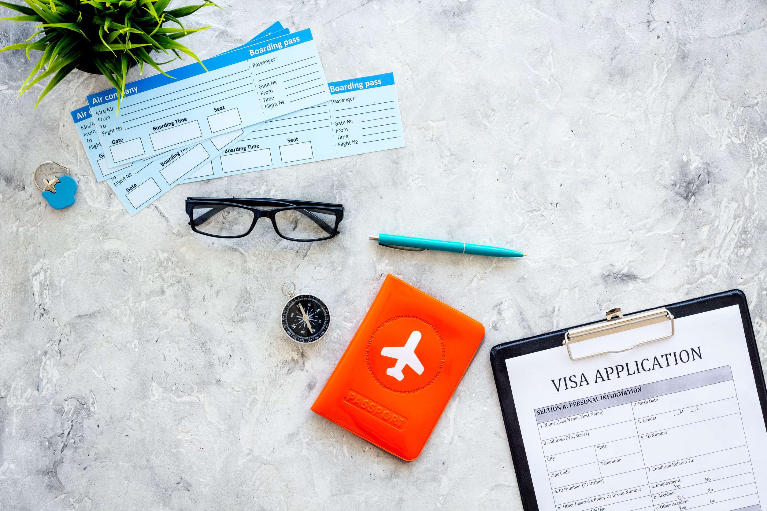 woman holding two air tickets in abroad passport near airport