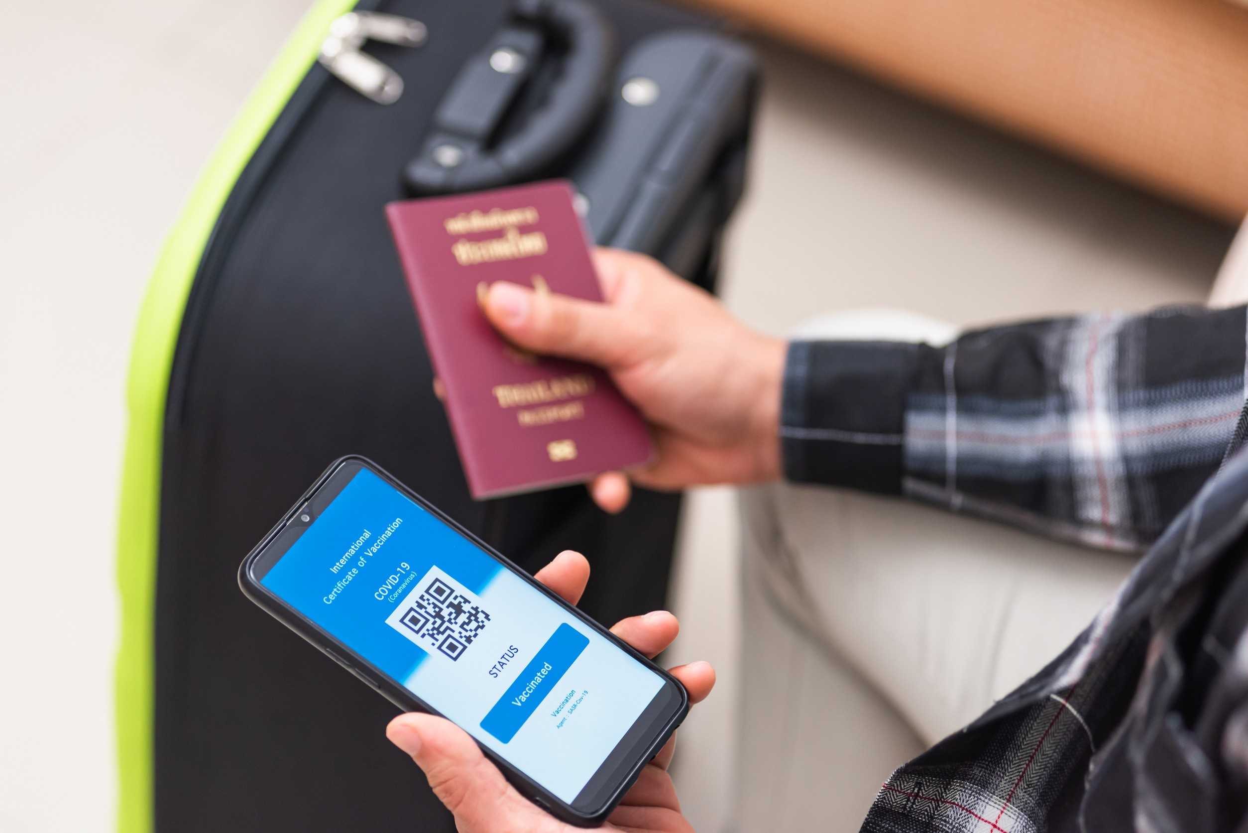 vaccination passport traveler man holding health passport